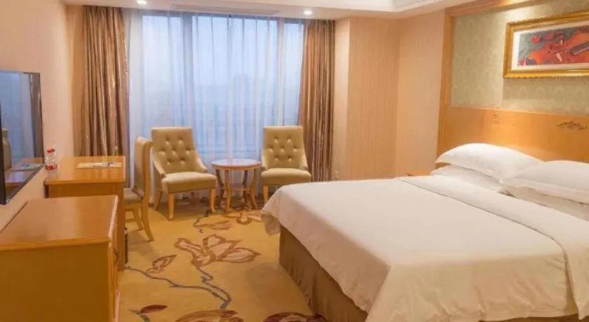 Bed in Vienna Hotel Guangxi Guilin Xing'an