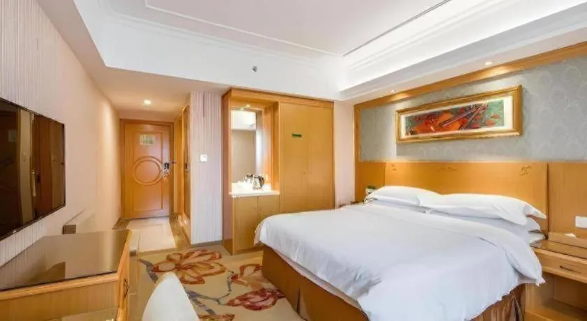 Bed in Vienna Hotel Guangxi Guilin Xing'an