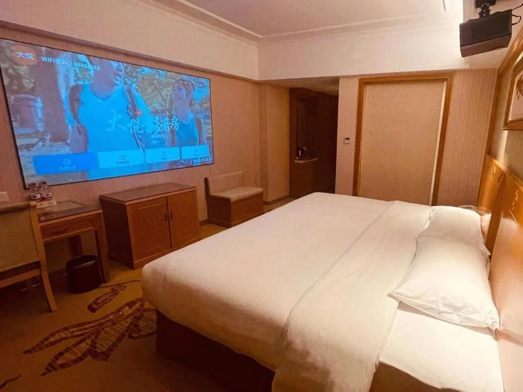 Bed in Vienna Hotel Guangxi Guilin Xing'an