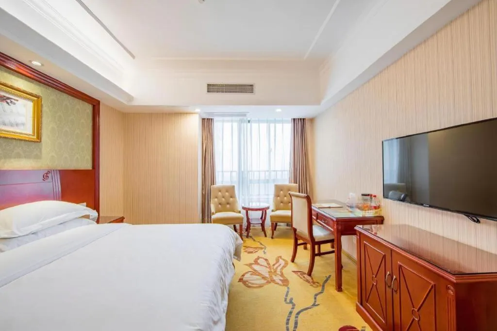 Bed in Vienna Hotel Guangxi Guilin Xing'an