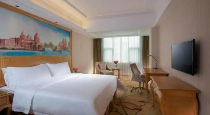 Bed in Vienna Hotel Guangxi Guilin Xing'an