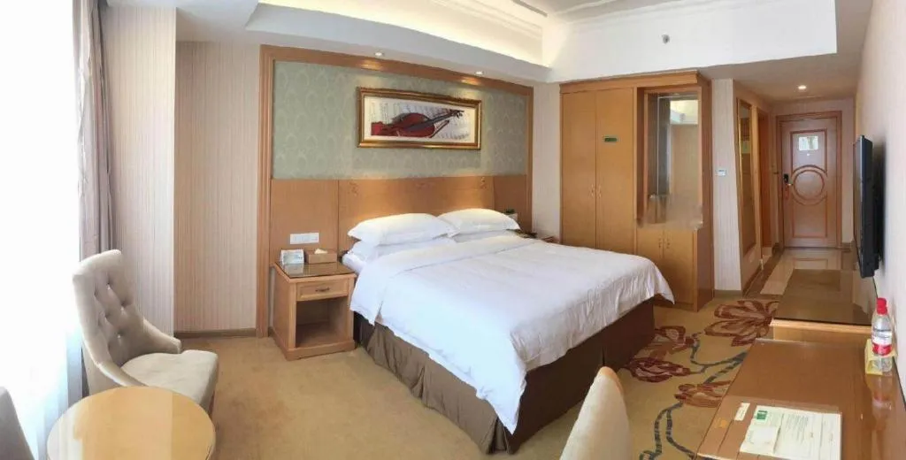 Bed in Vienna Hotel Guangxi Guilin Xing'an