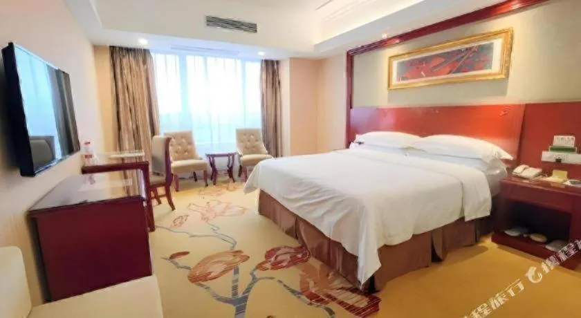 Bed in Vienna Hotel Guangxi Guilin Xing'an