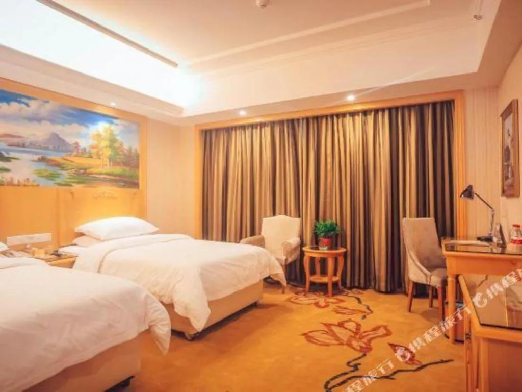 Bed in Vienna Hotel Hunan Yueyang Linxiang