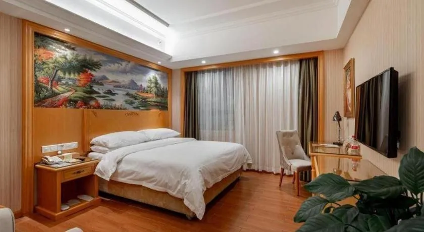 Bed in Vienna Hotel Hunan Yueyang Linxiang