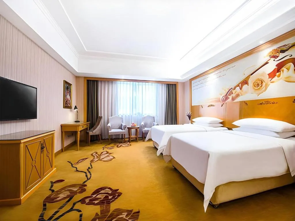 Bed in Vienna Hotel Hunan Yueyang Linxiang
