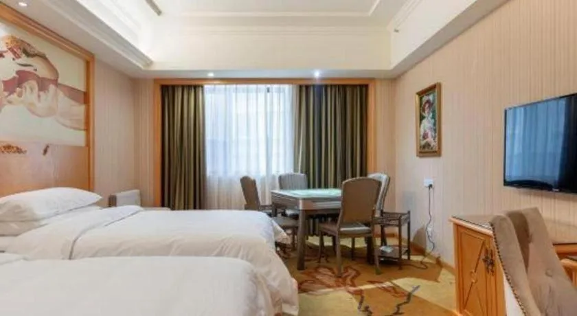 Bed in Vienna Hotel Hunan Yueyang Linxiang