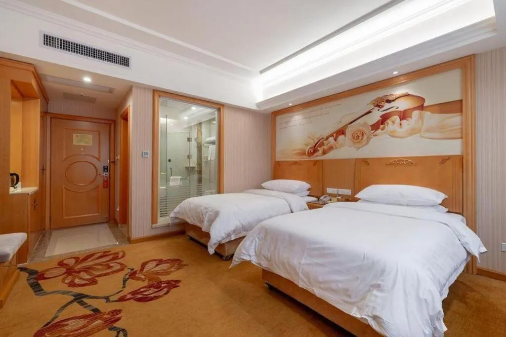 Bed in Vienna Hotel Hunan Yueyang Linxiang