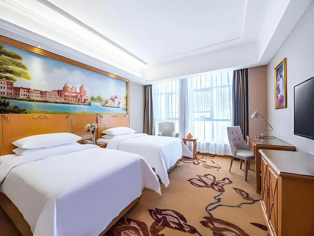 Bed in Vienna Hotel Hunan Yueyang Linxiang