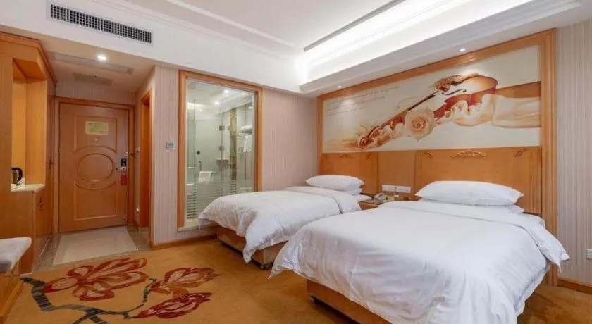 Bed in Vienna Hotel Hunan Yueyang Linxiang