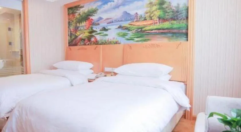 Bed in Vienna Hotel Hunan Yueyang Linxiang