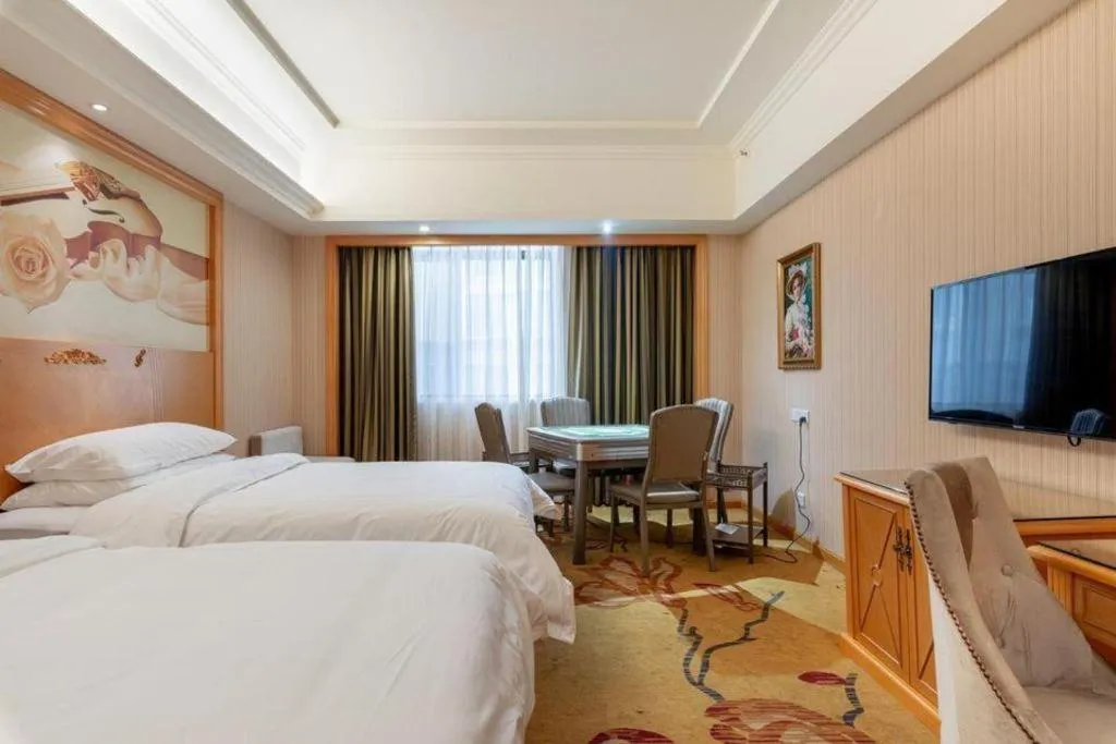 Bed in Vienna Hotel Hunan Yueyang Linxiang