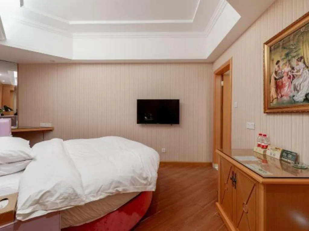 Bed in Vienna Hotel Hunan Yueyang Linxiang