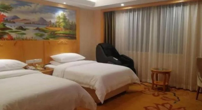 Bed in Vienna Hotel Hunan Yueyang Linxiang