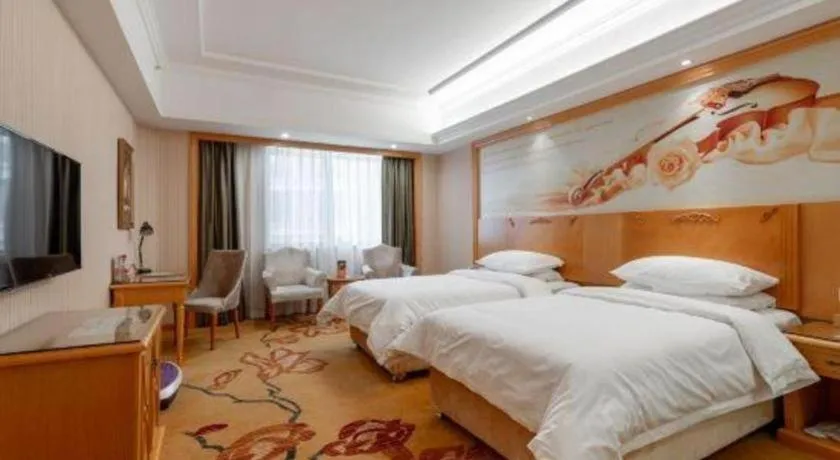 Bed in Vienna Hotel Hunan Yueyang Linxiang