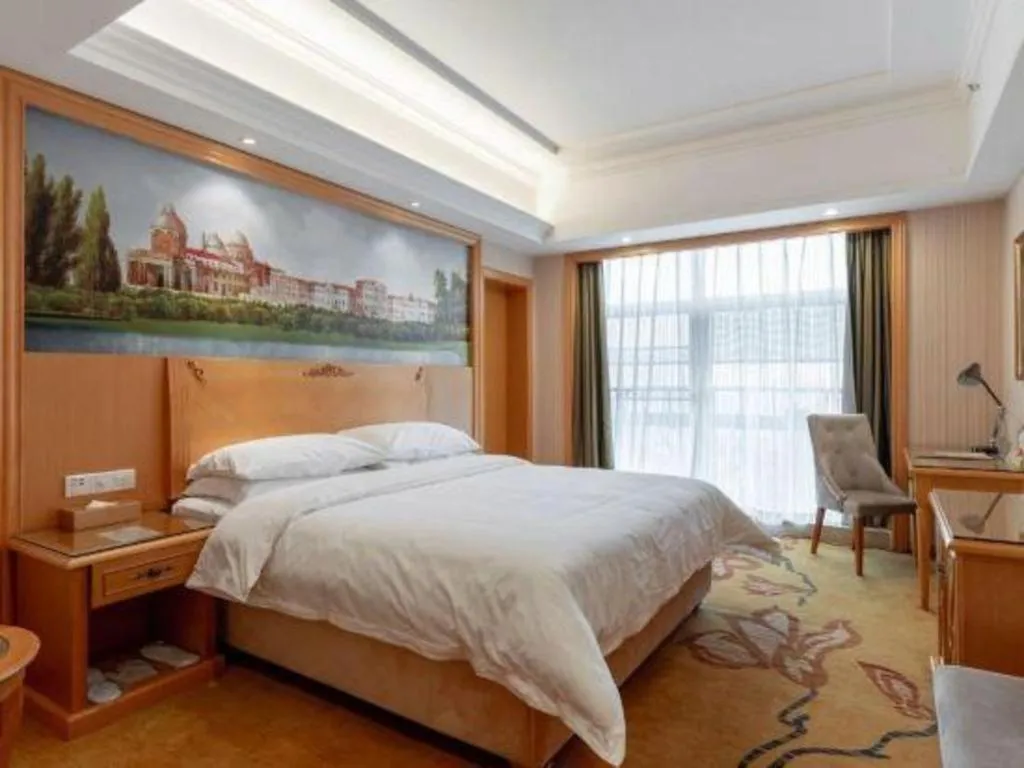 Bed in Vienna Hotel Hunan Yueyang Linxiang