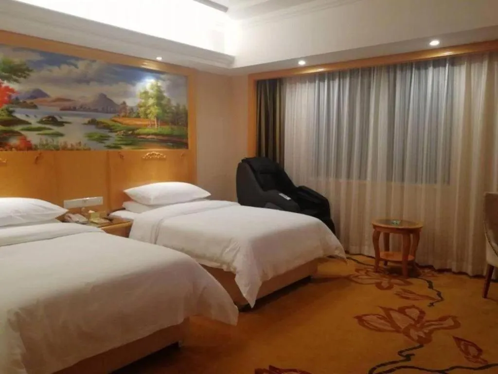 Bed in Vienna Hotel Hunan Yueyang Linxiang