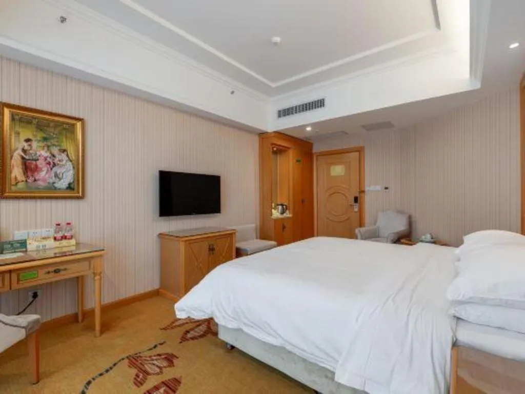Bed in Vienna Hotel Hunan Yueyang Linxiang