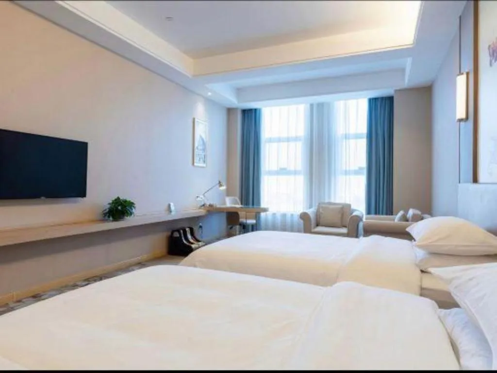 Bed in Vienna Hotel Jinan Railway Station