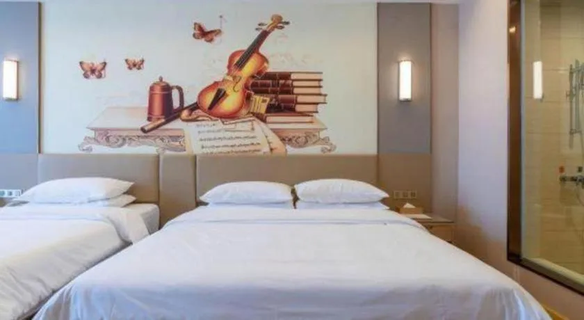 Bed in Vienna Hotel Jinan Railway Station