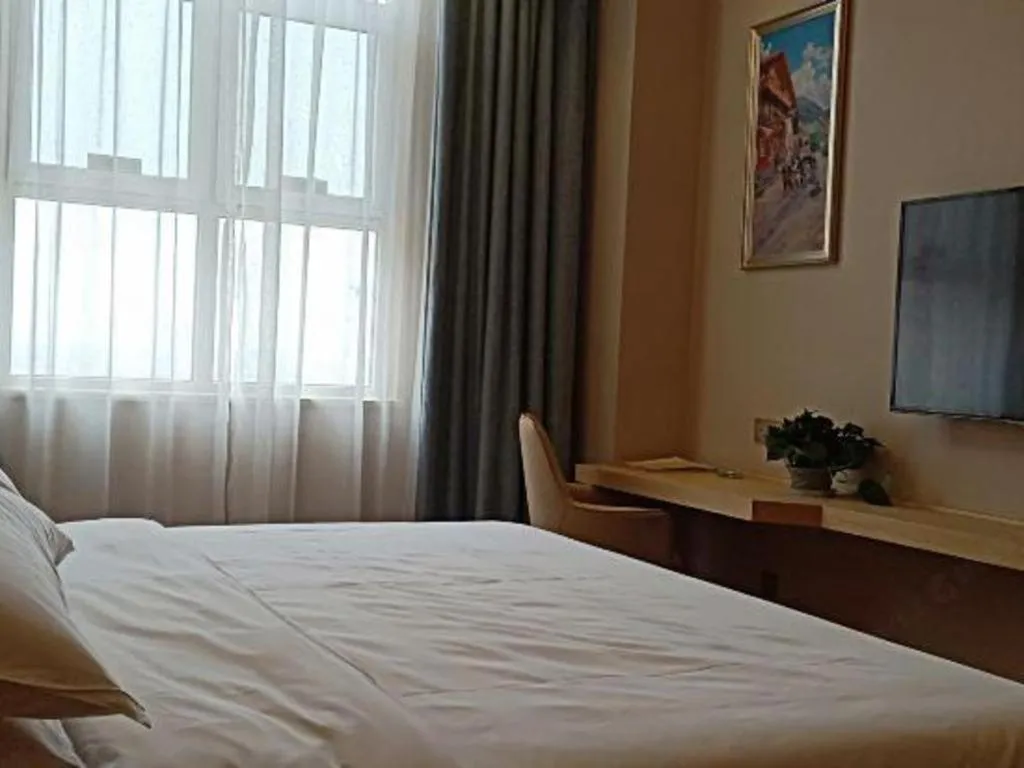 Bed in Vienna Hotel Jinan Railway Station