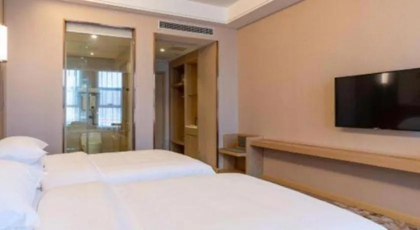 Bed in Vienna Hotel Jinan Railway Station