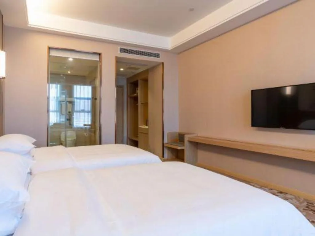 Bed in Vienna Hotel Jinan Railway Station