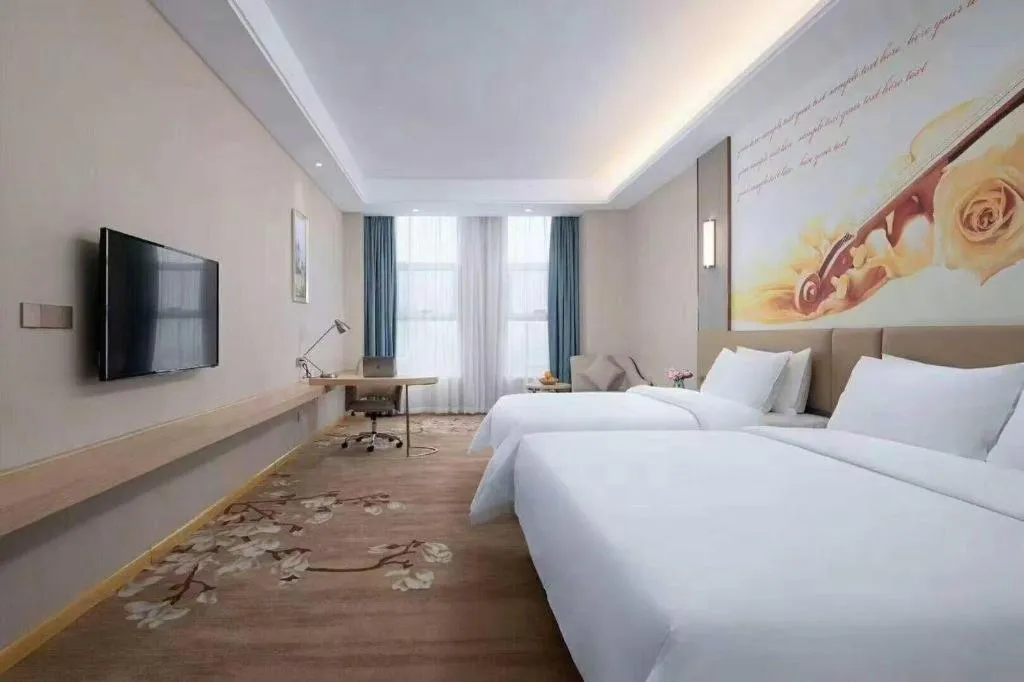 Bed in Vienna Hotel Jinan Railway Station