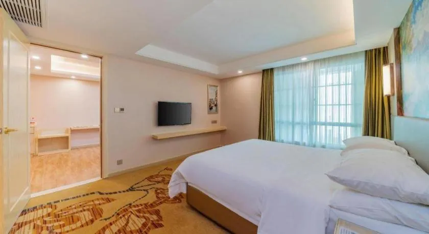 Bed in Vienna Hotel Guangdong Huizhou High-Speed North Railway Station Xiaojinkou