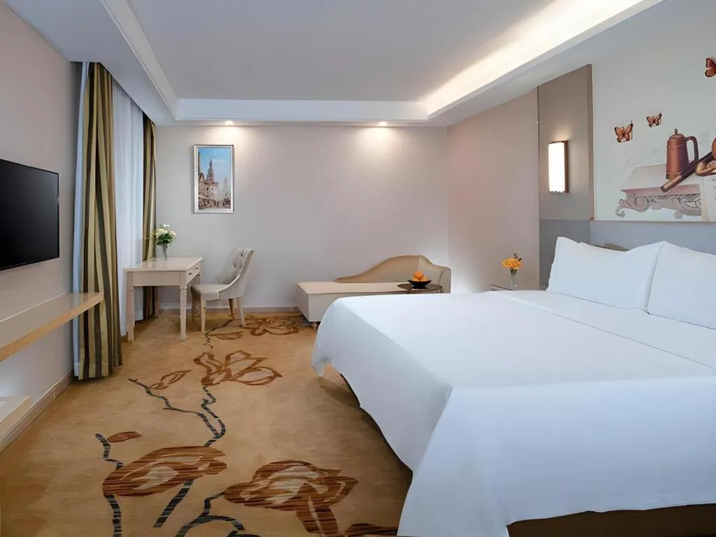 Bed in Vienna Hotel Guangdong Huizhou High-Speed North Railway Station Xiaojinkou