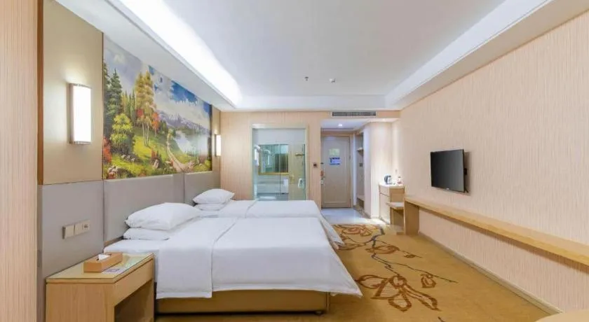Bed in Vienna Hotel Guangdong Huizhou High-Speed North Railway Station Xiaojinkou