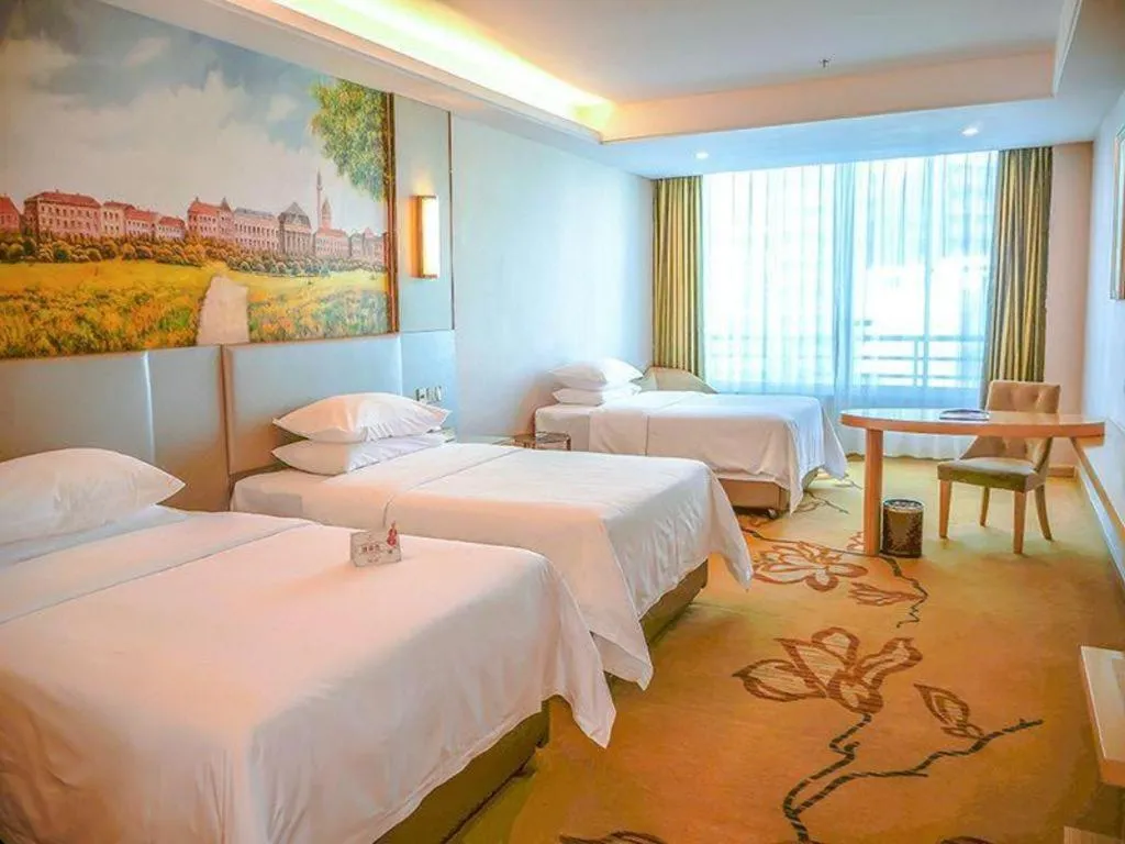 Bed in Vienna Hotel Guangdong Huizhou High-Speed North Railway Station Xiaojinkou