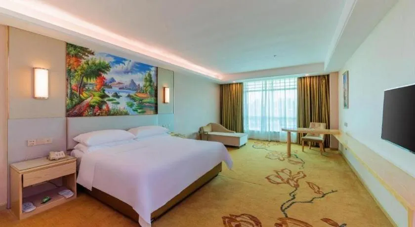 Bed in Vienna Hotel Guangdong Huizhou High-Speed North Railway Station Xiaojinkou