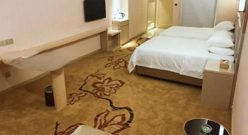 Bed in Vienna Hotel Guangdong Huizhou High-Speed North Railway Station Xiaojinkou