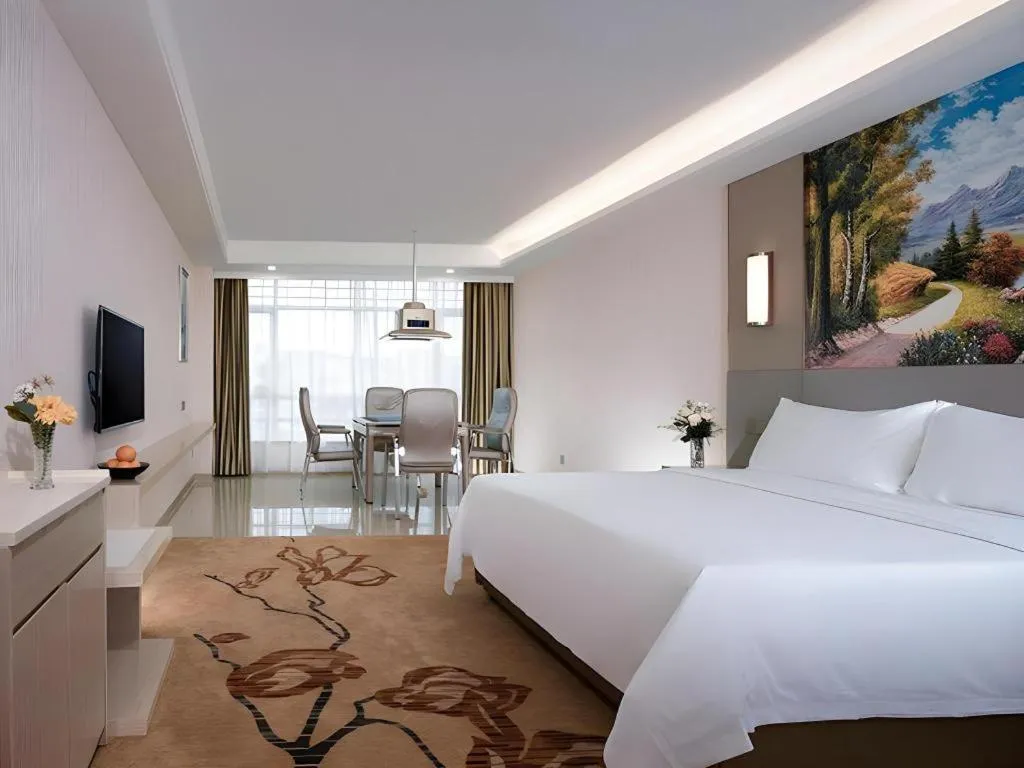 Bed in Vienna Hotel Guangdong Huizhou High-Speed North Railway Station Xiaojinkou
