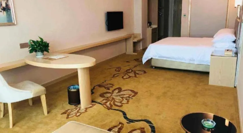Bed in Vienna Hotel Guangdong Huizhou High-Speed North Railway Station Xiaojinkou