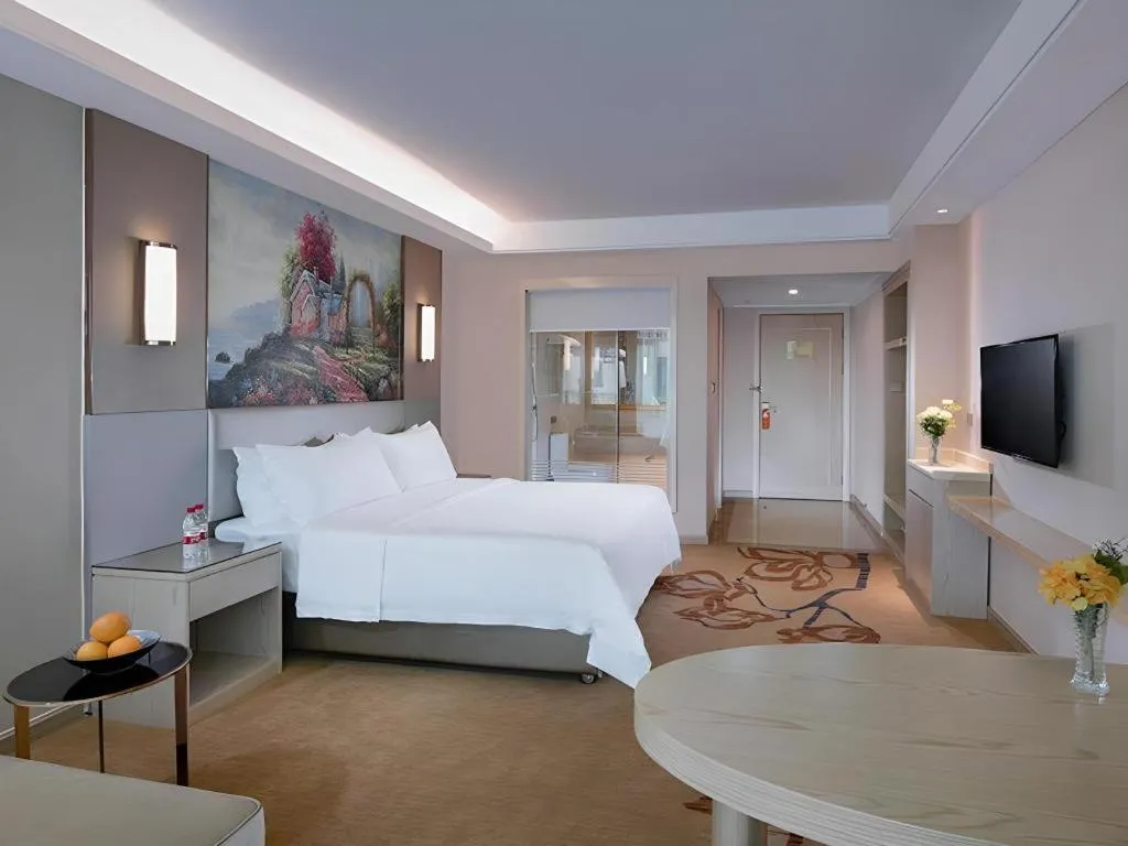 Bed in Vienna Hotel Guangdong Huizhou High-Speed North Railway Station Xiaojinkou