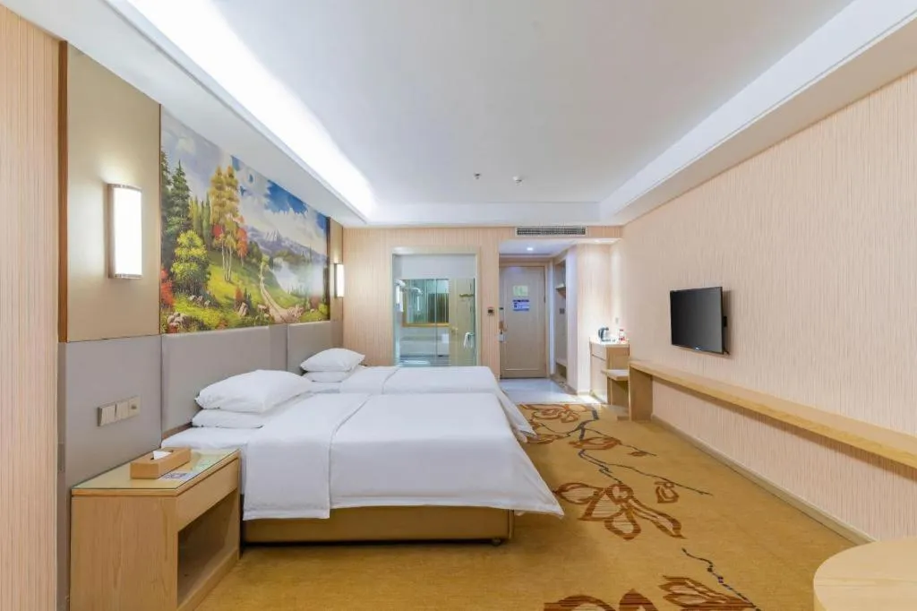 Bed in Vienna Hotel Guangdong Huizhou High-Speed North Railway Station Xiaojinkou