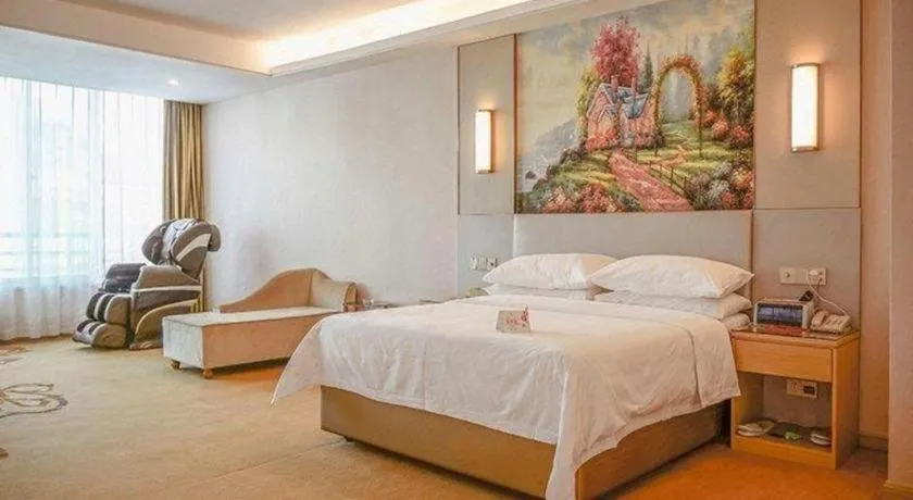 Bed in Vienna Hotel Guangdong Huizhou High-Speed North Railway Station Xiaojinkou