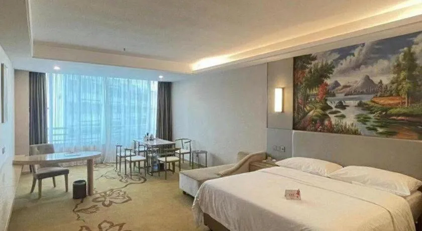 Bed in Vienna Hotel Guangdong Huizhou High-Speed North Railway Station Xiaojinkou