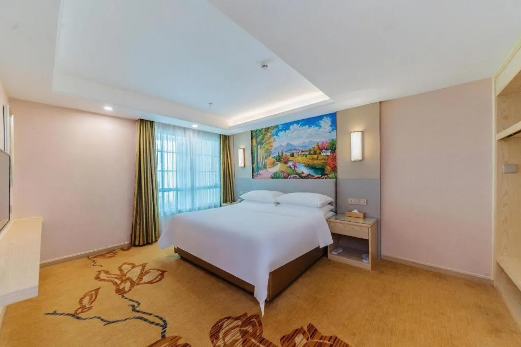 Bed in Vienna Hotel Guangdong Huizhou High-Speed North Railway Station Xiaojinkou
