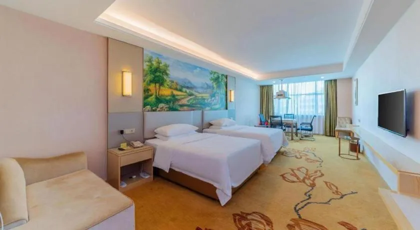 Bed in Vienna Hotel Guangdong Huizhou High-Speed North Railway Station Xiaojinkou