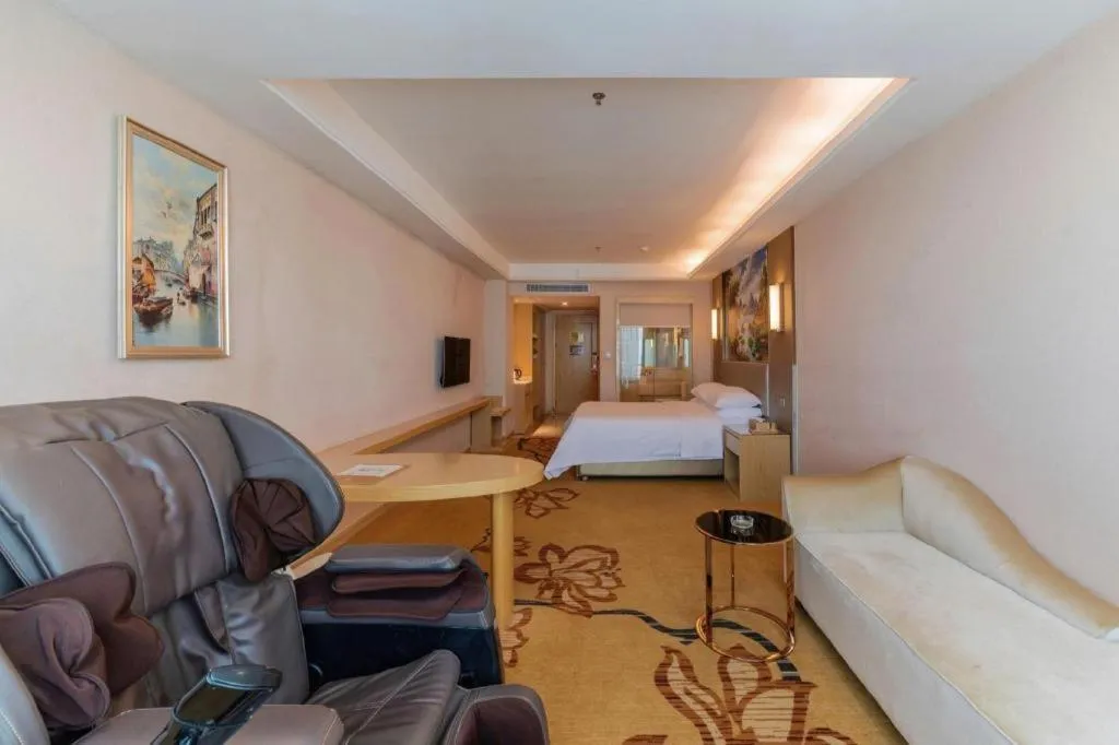 Bed in Vienna Hotel Guangdong Huizhou High-Speed North Railway Station Xiaojinkou