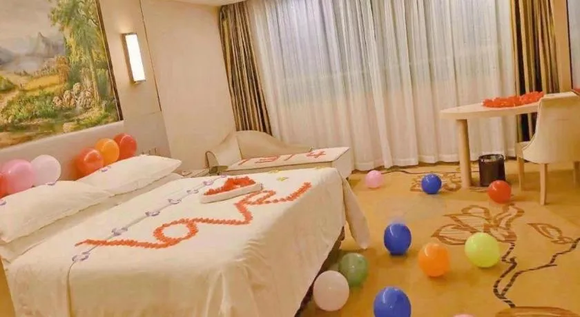 Bed in Vienna Hotel Guangdong Huizhou High-Speed North Railway Station Xiaojinkou