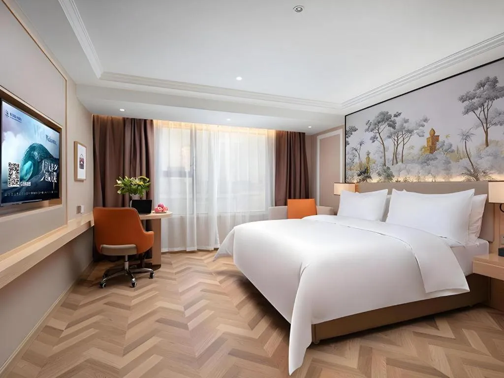 Bed in Vienna Hotel Yongzhou Dong'an High-Speed Railway Station