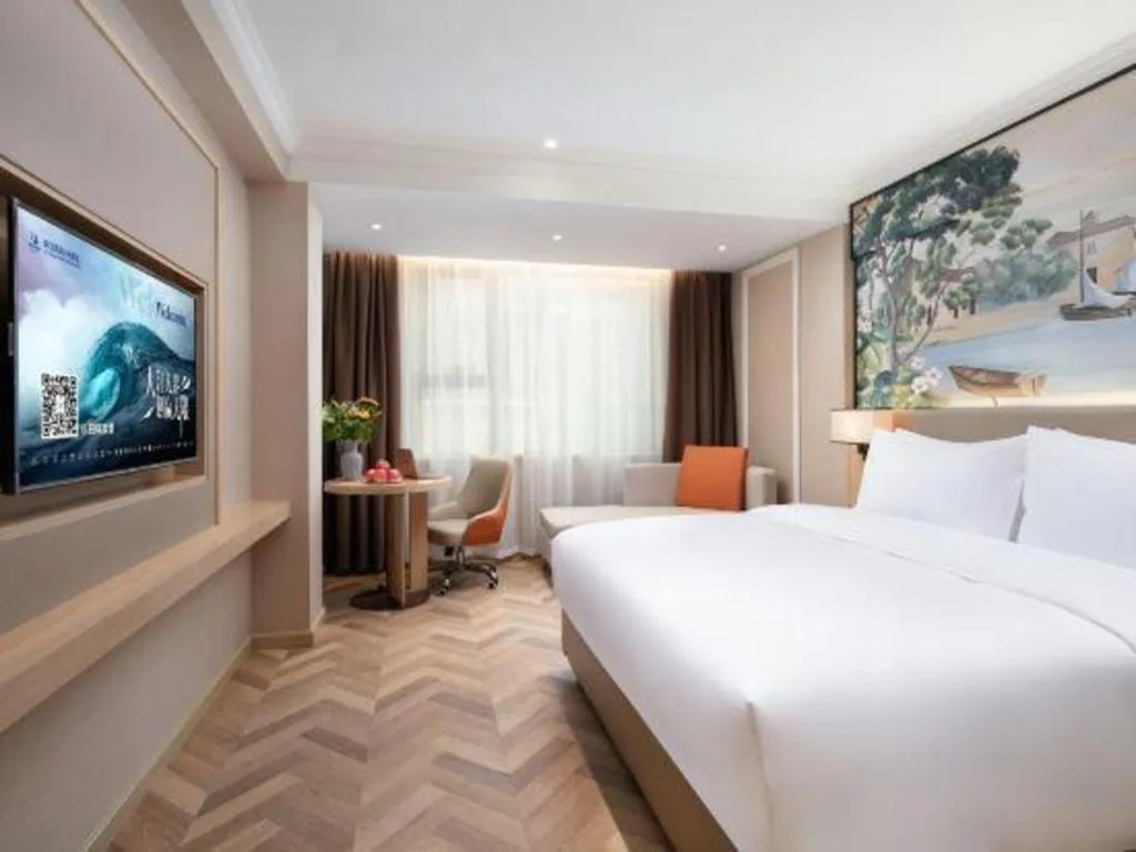 Bed in Vienna Hotel Yongzhou Dong'an High-Speed Railway Station