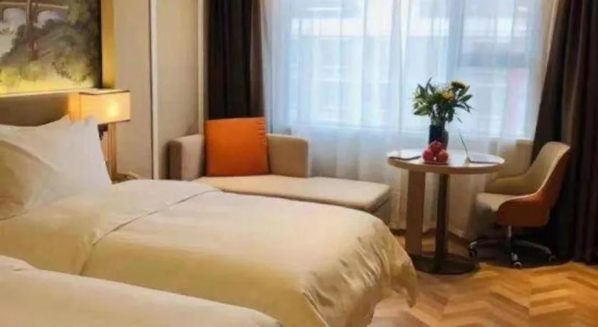 Bed in Vienna Hotel Yongzhou Dong'an High-Speed Railway Station