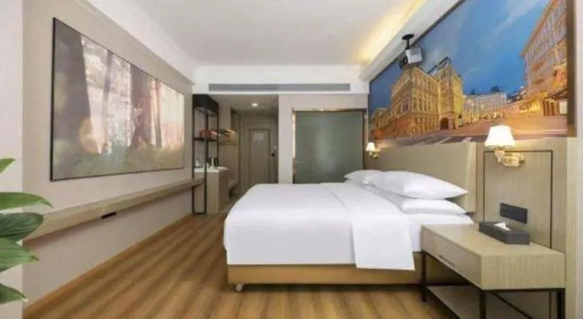 Bed in Vienna Hotel Yongzhou Dong'an High-Speed Railway Station