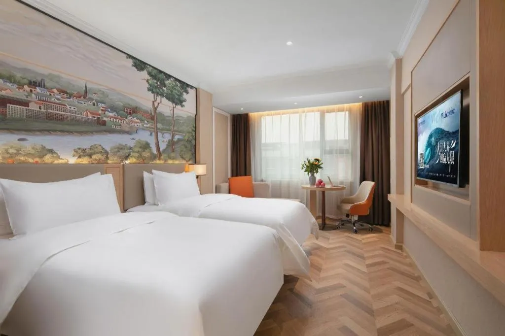 Bed in Vienna Hotel Yongzhou Dong'an High-Speed Railway Station