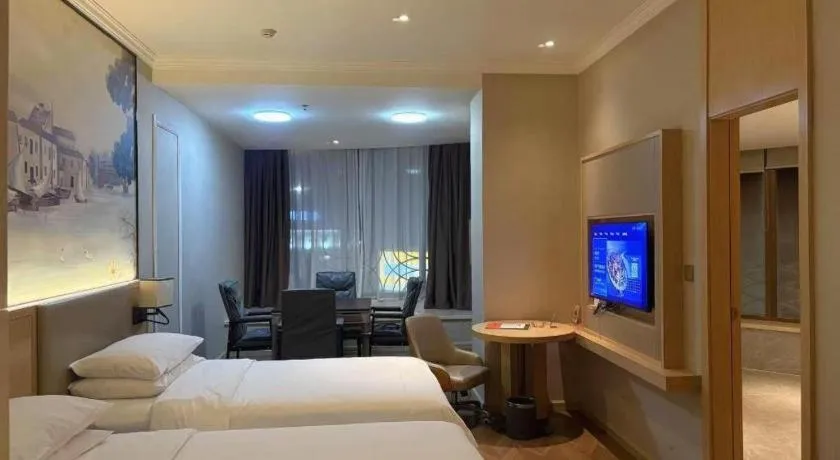 Bed in Vienna Hotel Yongzhou Dong'an High-Speed Railway Station